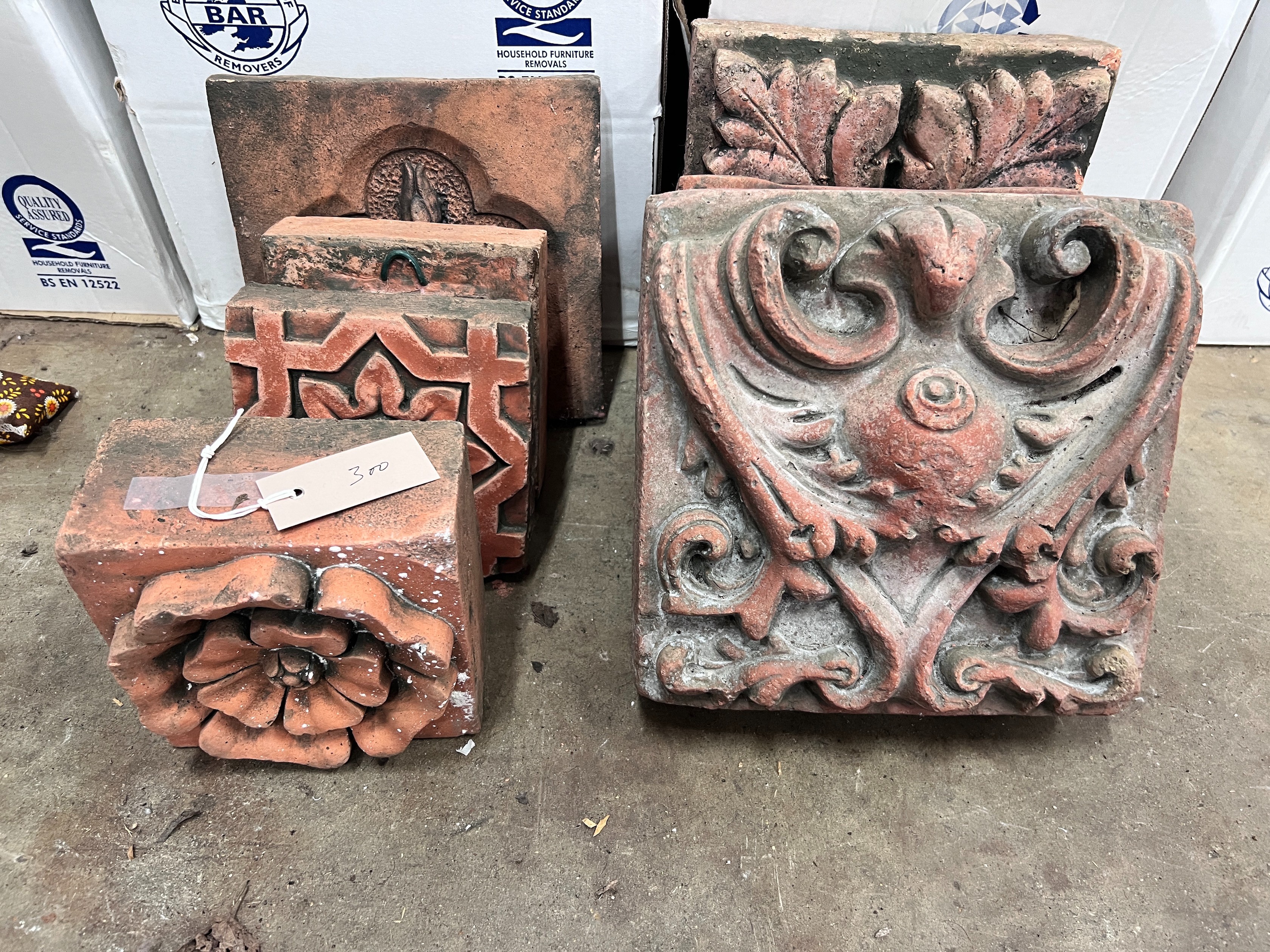 Seven assorted Victorian terracotta architectural decorative motifs, largest 25cm *Please note the sale commences at 9am.